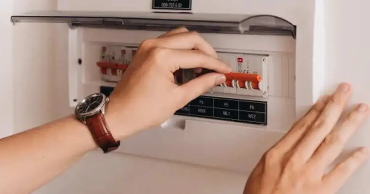 Electrician installing a safety switch
